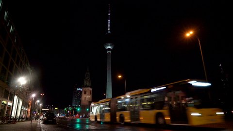 VIEW ALONG KARL LIEBKNECHT STRASSE AT NIGHT, BERLIN, GERMANY – 18 FEBRUARY 2019: Nighttime view along Karl Liebknecht Strasse towards Berliner Fernsehturm Television Tower, Berlin, Germany