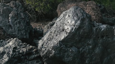 dark big stone obsidian rock