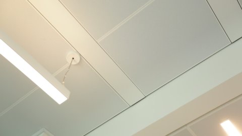 Office ceiling with modern lights - texture travelling right - left