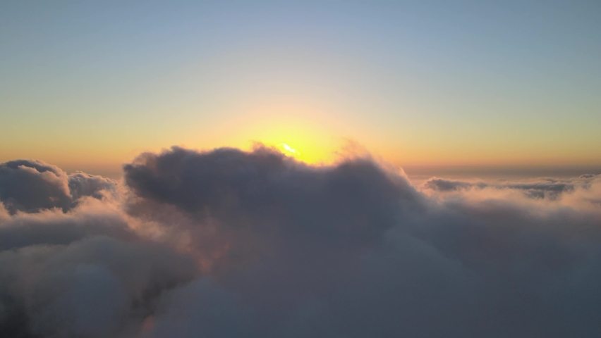 Drone view with Sunset and fly over clouds Royalty-Free Stock Footage #1076606522