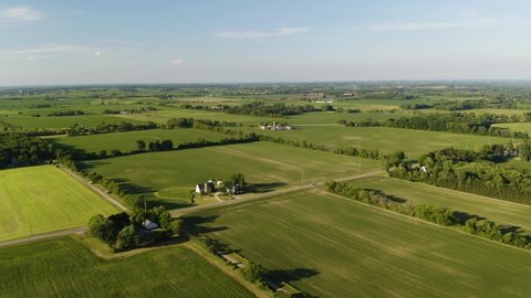 Aerial Hyperlapse High Above Rural Farm Landscape on Beautiful Summer Afternoon