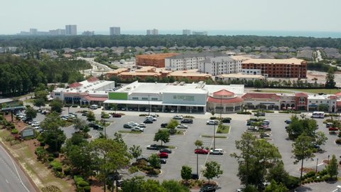 Myrtle Beach , SC , United States - 06 15 2021: Chef's Store in strip mall. Growth in retail and residential area as population grows.