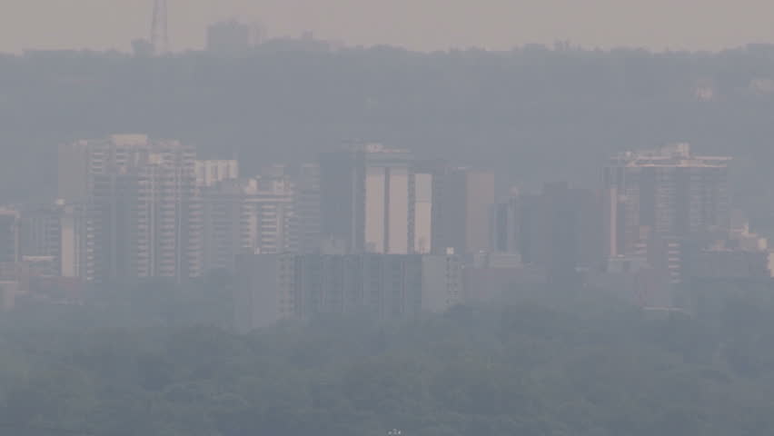 Smog and pollution cover Hamilton Ontario on hot summer day in July