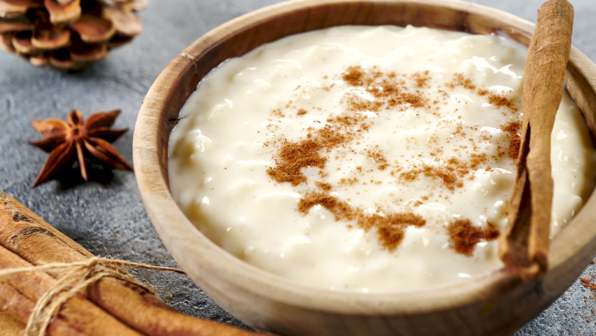 Rice pudding- rice, milk and spices | Shutterstock HD Video #1076621438