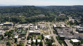 Cinematic 4K aerial drone footage of downtown Bothell, an upscale, affluent neighborhood between Kenmore and Woodinville, near Seattle Washington