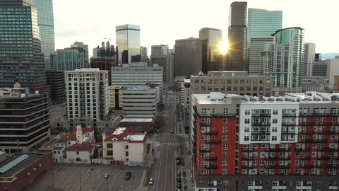 Downtown Denver, Colorado USA, Aerial View, Corporate and Residential Buildings at Sunset, Dolly Drone Shot