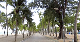 4k Hyperlapse speed footage on walking along the tropical Thailand famous beach and sea footpath, Bangsean Chonburi. The video compose of unidentified people come for doing recreational activities.