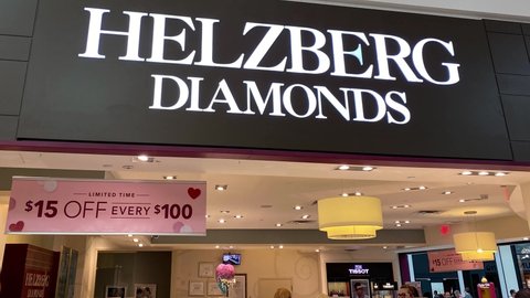 Orlando, FL USA - February 6, 2020:  Panning up on the exterior of a Helzberg Diamonds store in Orlando, Florida.