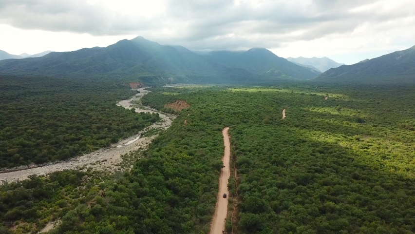 View from the skies through the mountains and clouds in Mexico.