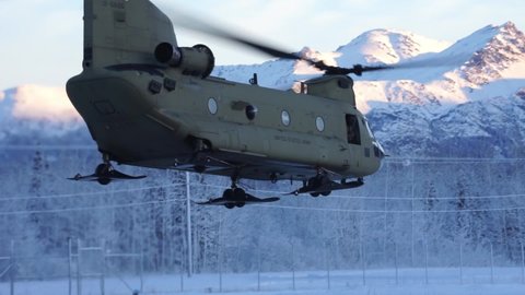 2020 Alaska National Guard pilots and crew fly Chinook helicopter to deliver Christmas gifts to children in remote villages.