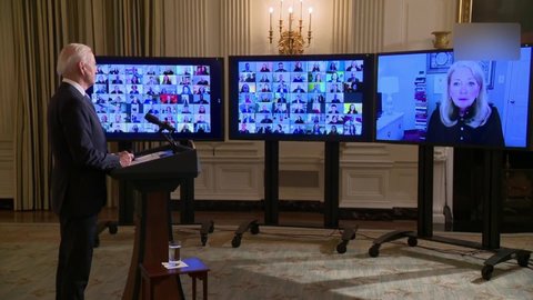 President Joe Biden welcomes White House political appointees to his administration during a high tech virtual ceremony.