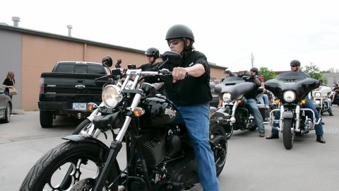 Governor Rick Perry rides a wounded vet’s Harley Davidson motorcyle, supporting Puppy Jake Foundation, 2016 Iowa Caucus.