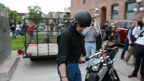 Governor Rick Perry rides a wounded vet’s Harley Davidson motorcyle, supporting Puppy Jake Foundation, 2016 Iowa Caucus.