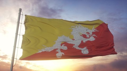 Flag of Bhutan waving in the wind, sky and sun background