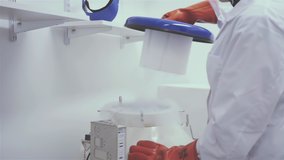 Technician Opening a Cryotank with Frozen Samples in Liquid Nitrogen at the Lab. Close Up. 4K Resolution. - Powered by Shutterstock - Get 15% off with code: PIKWIZARD15