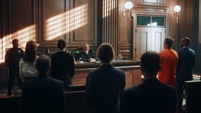 Court of Law and Justice Trial: Imparcial Honorable Judge Pronouncing Sentence, Striking Gavel. Cinematic Shot of Male Lawbreaker in Orange Robe Sentenced to Serve Time in Prison. Hearing Adjourned, - Powered by Shutterstock - Get 15% off with code: PIKWIZARD15