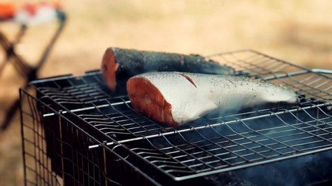 Roast Healthy Food. Smoked Grilled Salmon Fillets.Fish Cooked On Grill.Fresh Salmon Fried On Grill With Seasoning.Trout Being Grilled. Steak Of Fresh Fish Is Fried Grill. Fried Grill Salmon With Spice