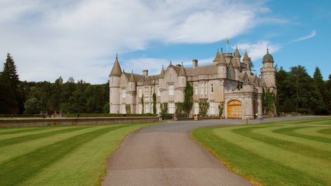 CRATHIE, SCOTLAND, circa 2021 - Cinematic view of Balmoral Castle, a large residence in Royal Deeside, Scotland, UK, developed by Queen Victoria and Prince Albert in 1856, in Scottish Baronial style