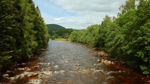 Wide view of river Dee in the Royal Deeside, Aberdeenshire, Scotland, England, UK, a region made famous by Queen Victoria