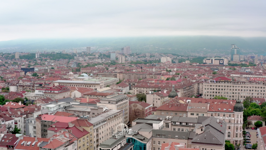 Aerial view Sofia Bulgaria. Downtown city with side architecture houses in the city center. Urban landscape with the roofs of houses and streets of the European capital.