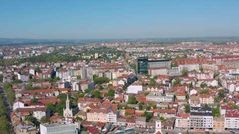 Novi Sad, Serbian city streets and buildings on summer day, 4K view over city