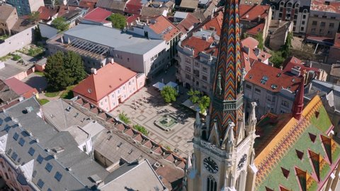 Beautiful church spire in central Novi Sad, aerial view of Serbian city