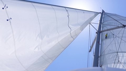 open sails on a yacht