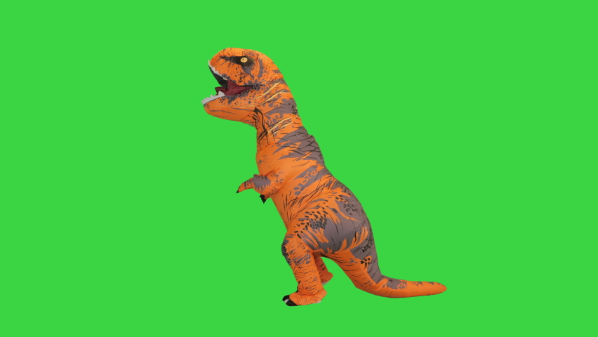 Funny dancing of a man in a dinosaur costume on a Green Screen, Chroma Key. | Shutterstock HD Video #1076763071