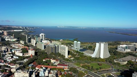 Porto Alegre, Rio Grande do Sul, Brazil - 07.27.2021 - Aerial view of landmark of brazilian city. Buildings at downtown city of Porto Alegre, Rio Grande do Sul, Brazil. Guaiba River Edge aerial view.