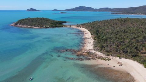 Beautiful Scenery Of Hydeaway Bay Beach And Blackcurrant Island In Australian State Of North Queensland. descending drone shot