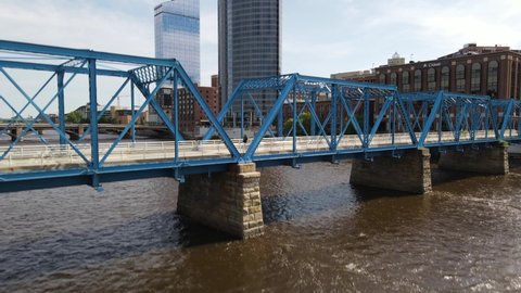 Grand Rapids, Michigan blue bridge and skyline drone video.