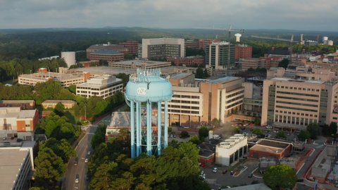 Chapel Hill , NC , United States - 06 13 2021: Water tower at UNC campus. University of North Carolina. Aerial view, establishing shot.