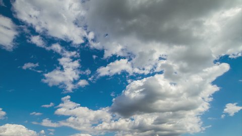 Beautiful blue sky with clouds background. Sky clouds. Sky with white clouds weather nature cloud blue. Blue sky with clouds. 4K Time lapse 60 fps