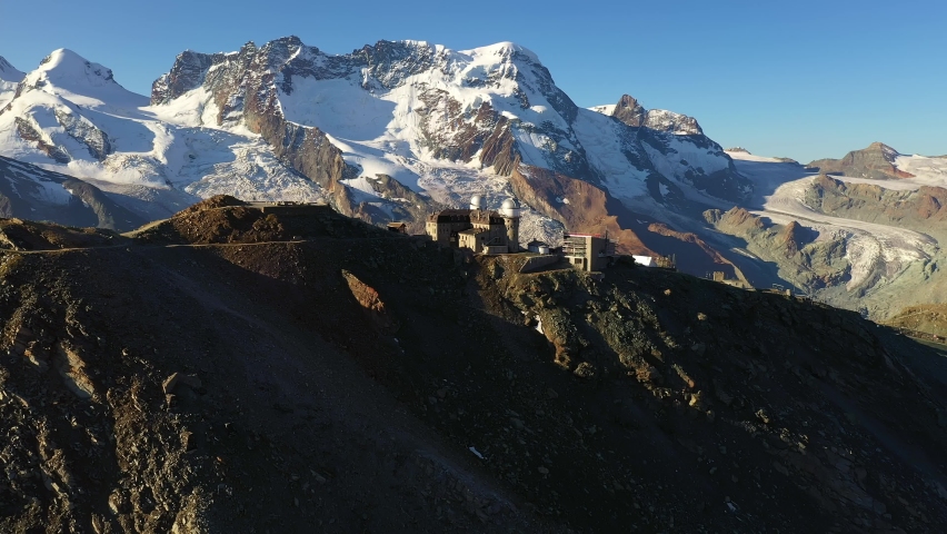 Aerial drone footage of the famous Gornergrat ridge in the alps in Zermatt, Switzerland
