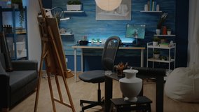 Empty creativity studio space with white canvas and easel for professional drawing. Nobody in artwork room but craft tools, colorful pencils, vase and equipment for creative design - Powered by Shutterstock - Get 15% off with code: PIKWIZARD15