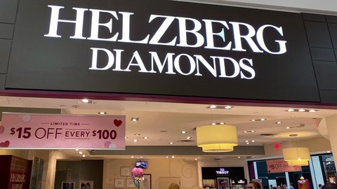Orlando, FL USA - February 6, 2020:  Panning up on the exterior of a Helzberg Diamonds store in Orlando, Florida.