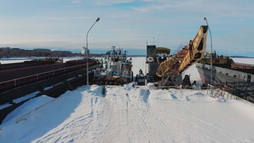 boats and ships in the port in winter