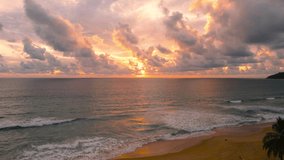 Nature video Scene of The view from the drone on the Andaman sea, the beautiful sunset sky over sea and natural.