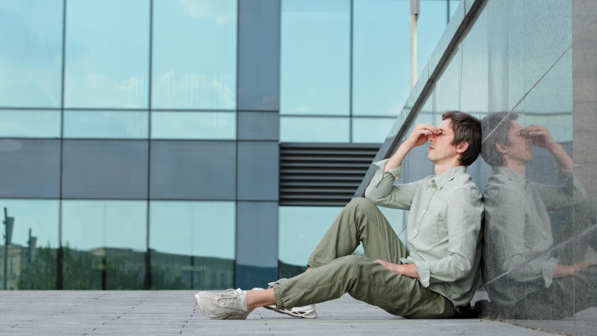 Thoughtful businessman boss thinking, guy try solve problem pose on glass building background, worried man feels concerned puzzled imagining lost in thoughts pondering making decision concept  - Powered by Shutterstock - Get 15% off with code: PIKWIZARD15