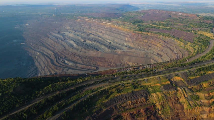 Huge iron ore quarry iron ore mining aerial video filming drone top view flight over | Shutterstock HD Video #1076828729