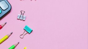 School supplies on a pink background. Back to school creative 