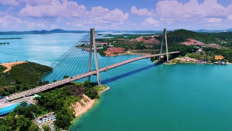 Scenic Aerial View of Suspension Bridges over the Sea, The cable-stayed Tengku Fisabilillah is connecting Batam Island and Tonton Island, Barelang, Batam, Riau Islands Province, Indonesia, Asia