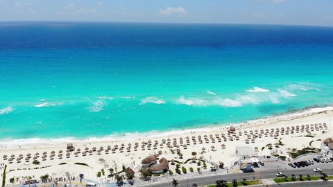 Aerial view of Playa Delfines, a tropical sandy beach on Caribbean sea coast in Cancun, Mexico