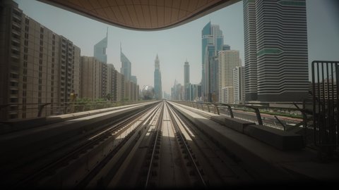 Metro In Dubai, United Arab Emirates. FPV POV At Fast Speed Drive Motion. driverless metro in blurred motion. futuristic city skyline in UAE. Long Exposure Time Lapse, Timelapse, Time-lapse, street