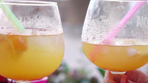 Celebratory toast with cocktails in slow motion 250fps