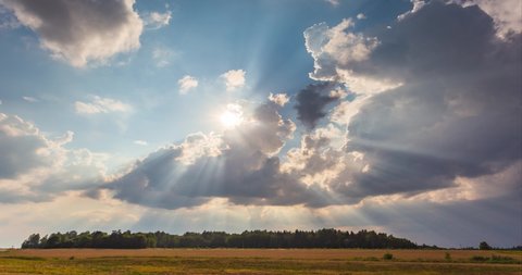 Timelapse of sun rays emerging through fluffy clouds, trust and hope, heaven