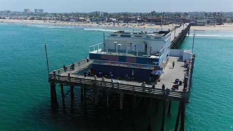 Aerial view of fisherman at the end of Newport Pier, Newport Beach, California