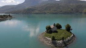 beautiful lake of Lac Serre-Ponçon, Alpes, France filmed by Drone, Aerial