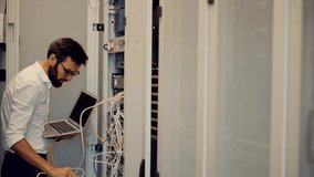 Admin Repairing Render Farm. Engineer On Cluster Console In Artificial Intelligence Server Room .Installation Network Hardware. Cryptography Network Server Controller.E-commerce Digitalization Server - Powered by Shutterstock - Get 15% off with code: PIKWIZARD15
