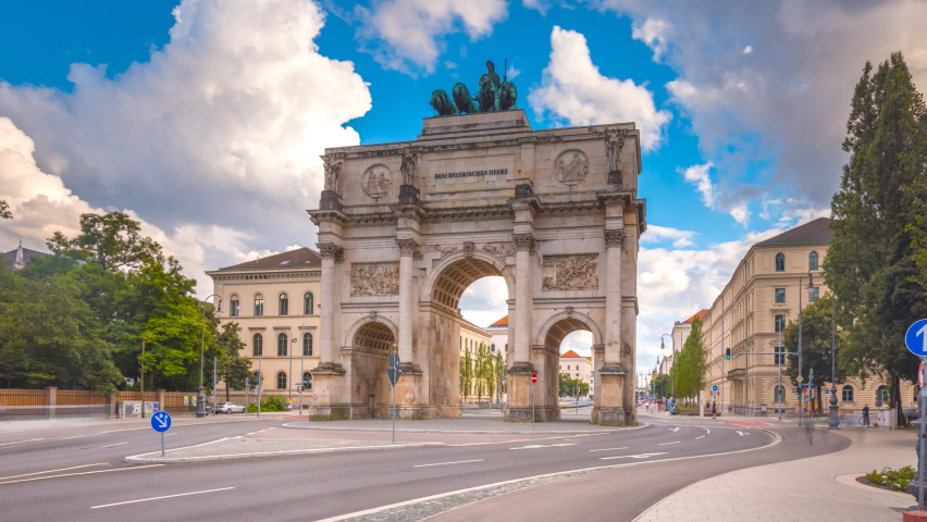 The Siegestor Victory Arch in Munich with traffic. Timelapse view in 4K. Royalty-Free Stock Footage #1076927786
